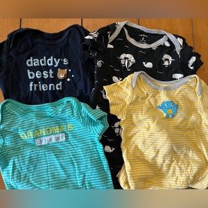 Set of 4 baby onesies from Carters